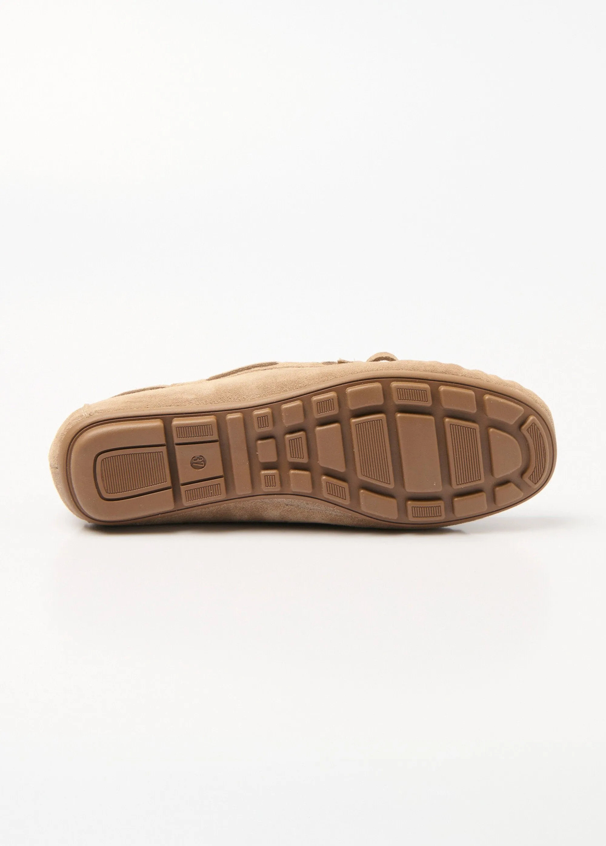 Leather loafers with knot and studded sole