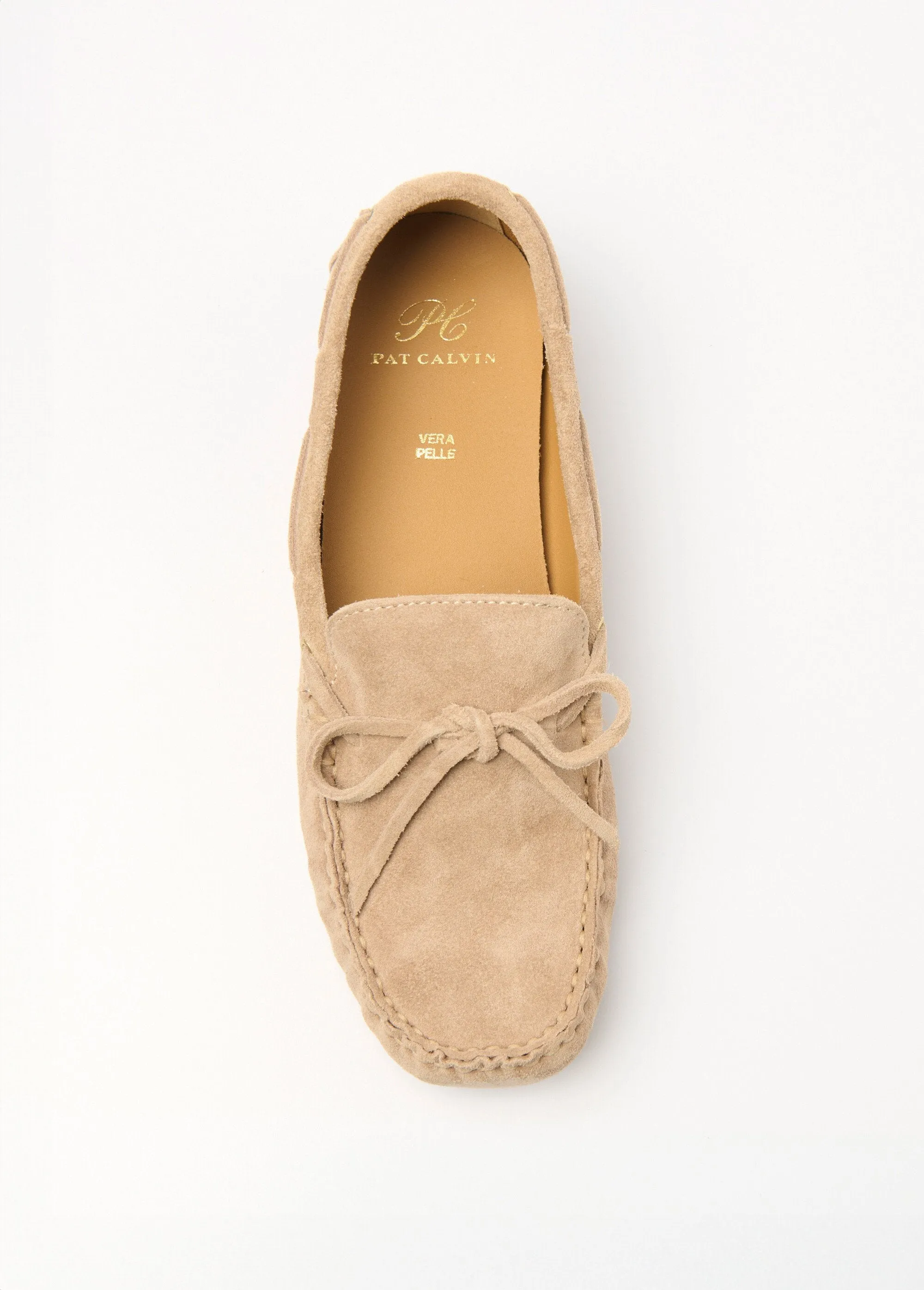 Leather loafers with knot and studded sole