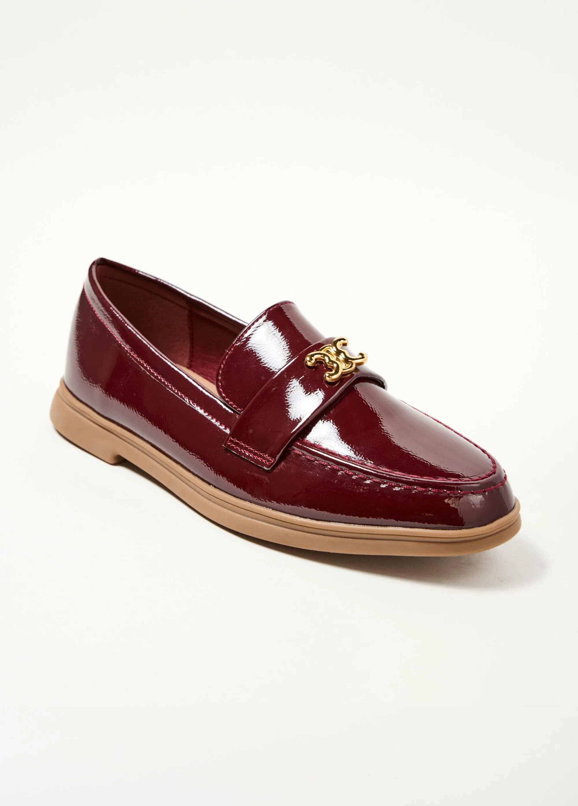 Patent leather loafers with fancy tab