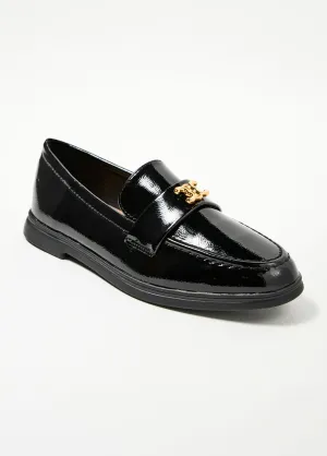 Patent leather loafers with fancy tab