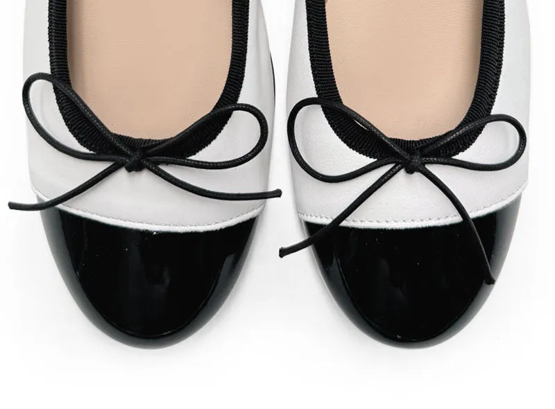 White leather ballet flats with high heel and patent toe
