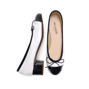 White leather ballet flats with high heel and patent toe